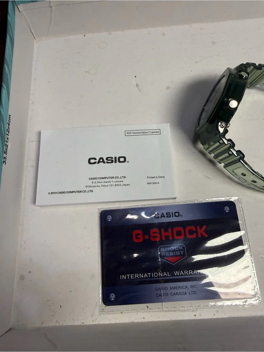 Casio G-Shock Watch - Black Case with Brown Dial and Red Accents